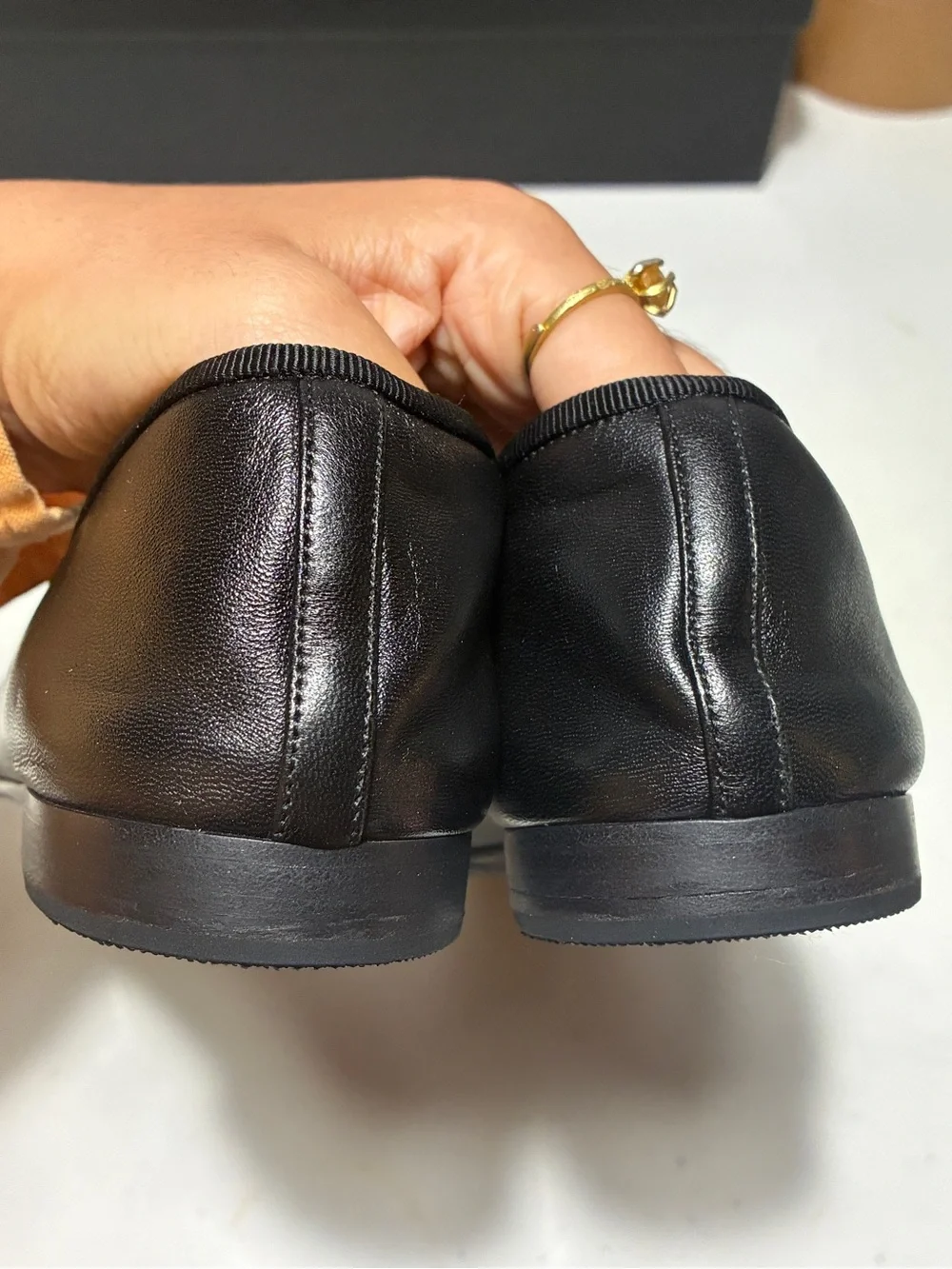 CHANEL Black Leather Cap-Toe Bow Ballet Flats